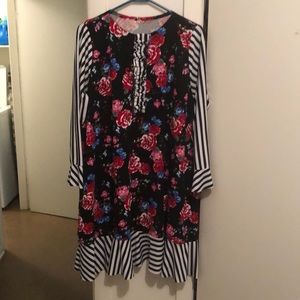 Black and white striped/floral outfit.